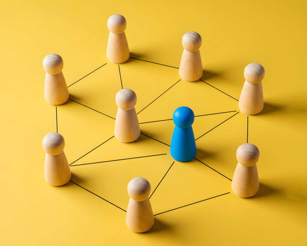 Home blue man in a connected network of people. workplace structure, professional communication and social networks. remote work and employee engagement topics.